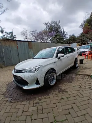 Toyota Corolla Fielder 1.5 Hybrid FWD 2019 White
