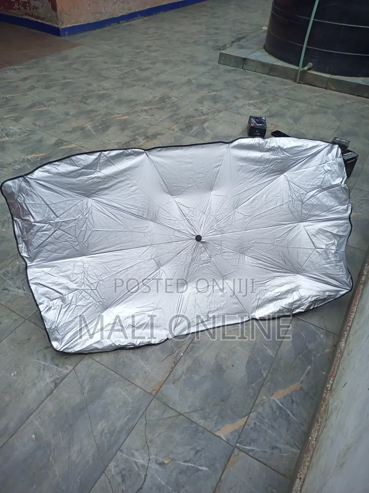 An Umbrella-Style Car Windshield Sunshade,