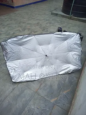 An Umbrella-Style Car Windshield Sunshade,