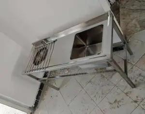 Stainless Steel Hospital Sluice Sink Measuring 1350mm by 550mm