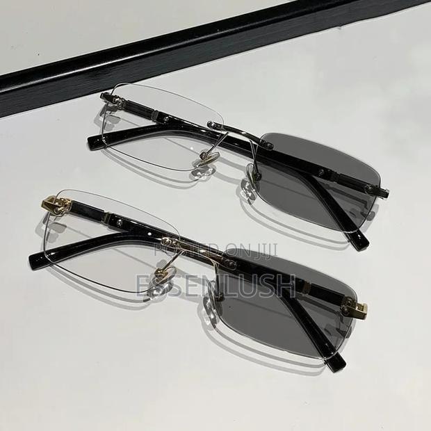 ​Executive Rimless Transition Glasses – Luxury Photochromic Anti-Blue