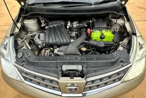 Nissan Tiida 2010 Gold