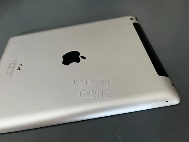 Apple iPad 4 Wi-Fi + Cellular 64 GB Silver - thumbnail 4