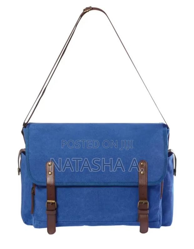 Blue Canvas Messenger Bag With Leather Straps. - main view