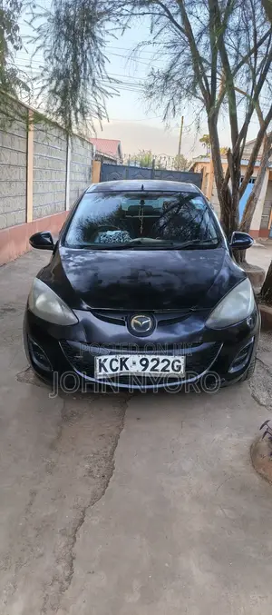 Mazda Demio 2009 Brown