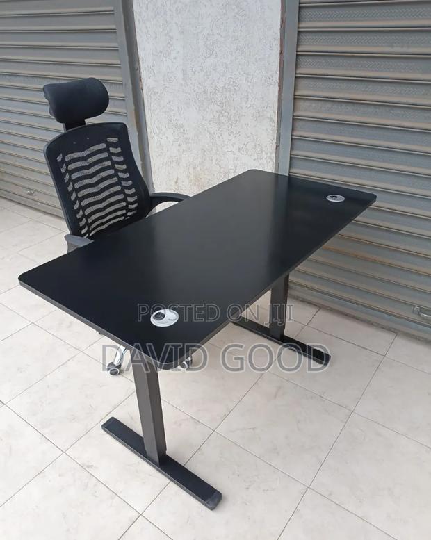 Adjustable Electric Standing Table and a Chair - main view
