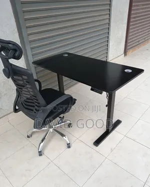 Adjustable Electric Standing Table and a Chair