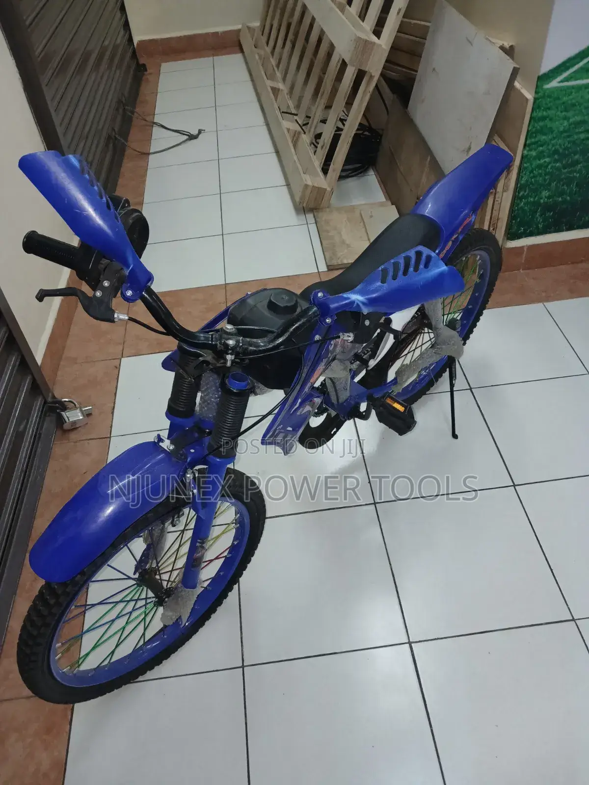 Blue Premier Racing Bike, a Motocross-Style Children's bicycle.Size 20