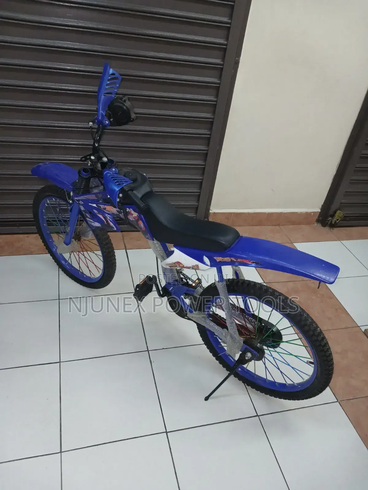 Blue Premier Racing Bike, a Motocross-Style Children's bicycle.Size 20