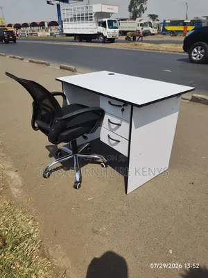 Mesh Office Desk With a White Office Desk