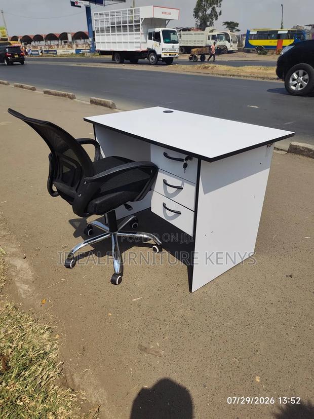 Mesh Office Desk With a White Office Desk