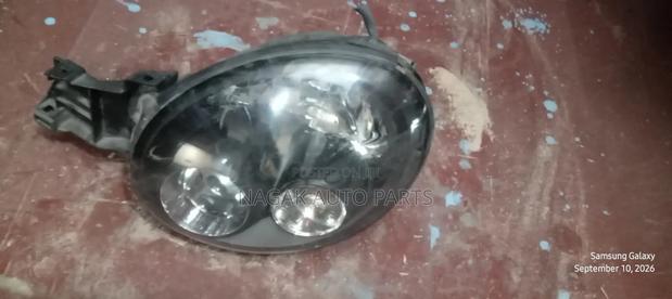 Mazda Impreza N10 Headlight - main view