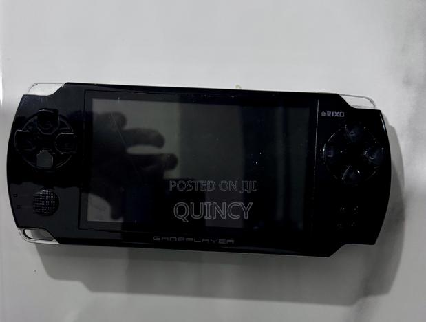 JXD Game Player Handheld Media Console / MP5 Retro Gaming Player
