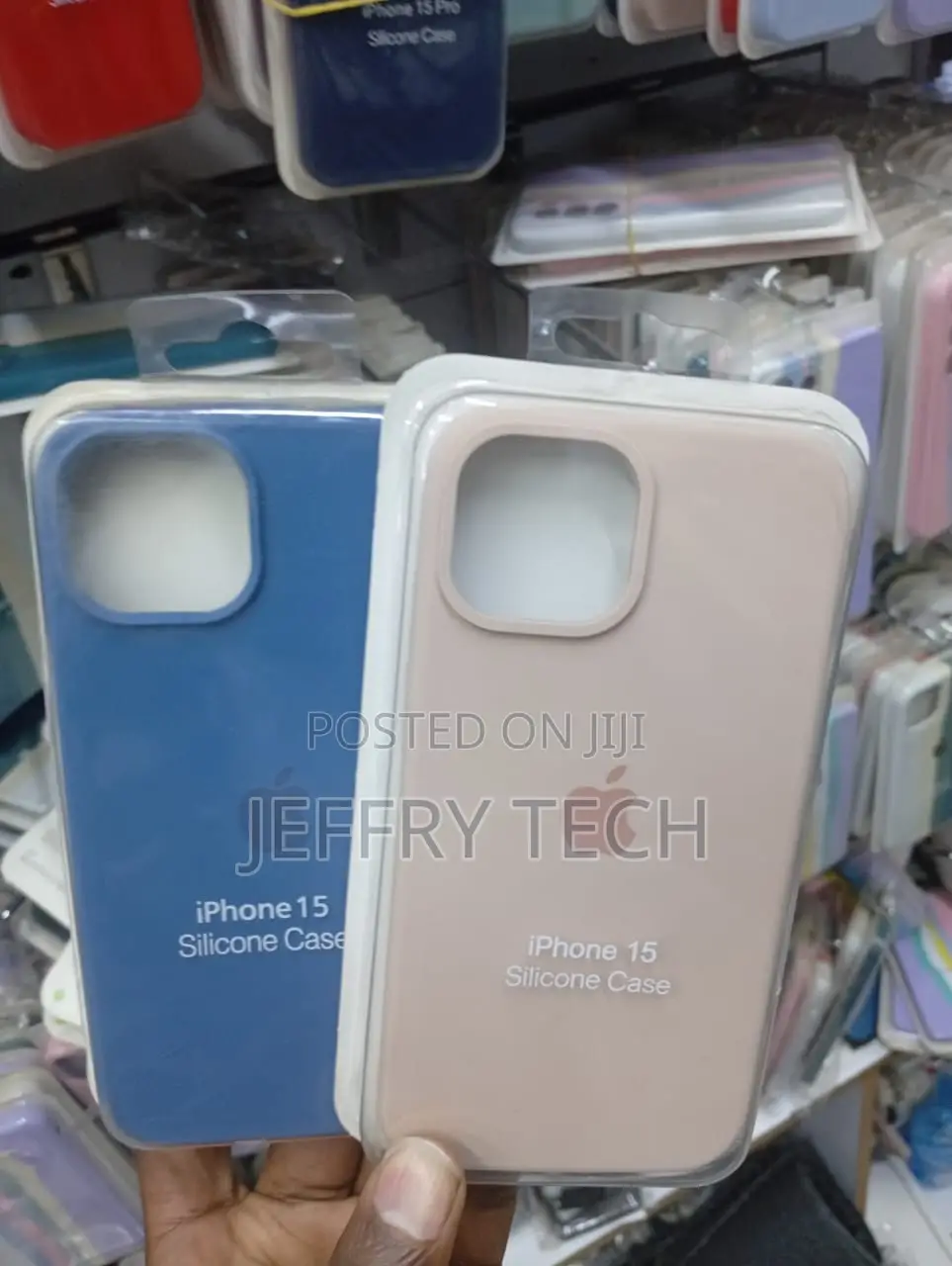 Silicone Back Cover Cases for the iPhone 15 in Blue and Light Pink.