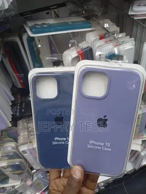 Silicone Back Cover Cases for the iPhone 15 in Blue and Light Pink.