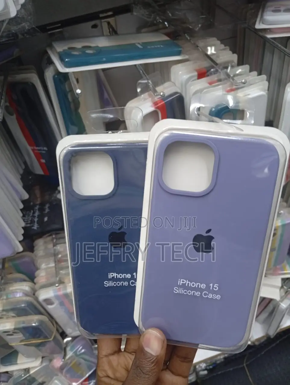 Silicone Back Cover Cases for the iPhone 15 in Blue and Light Pink.