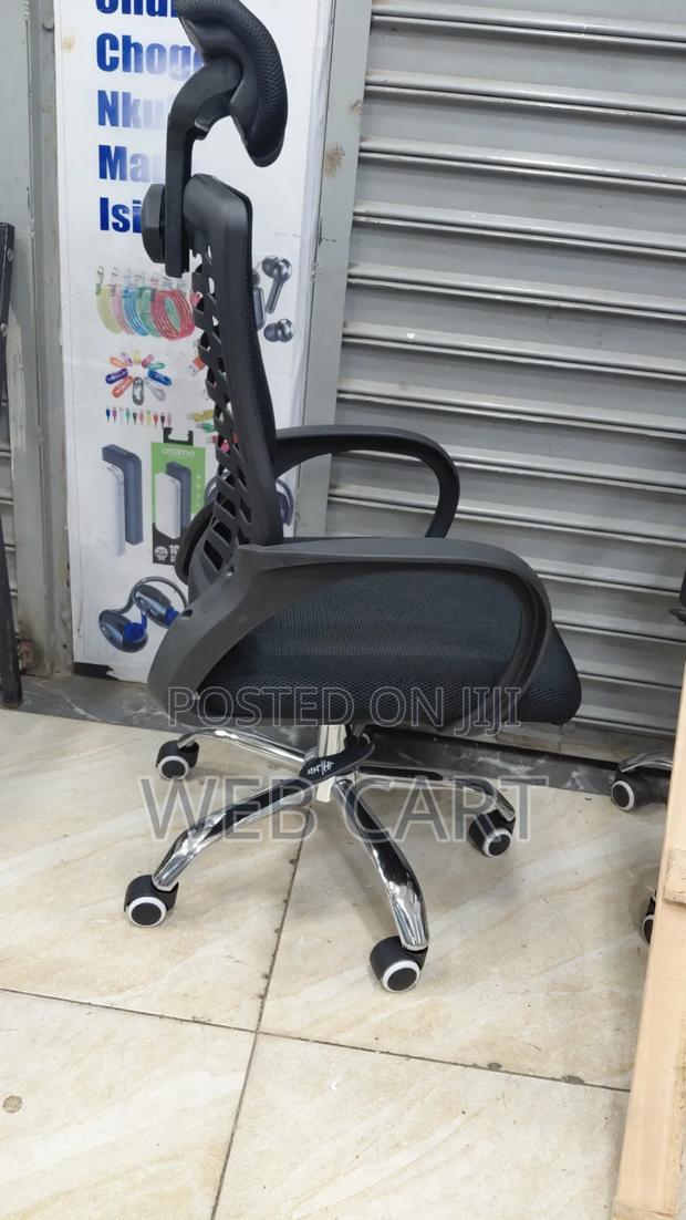 Adjustable Office Chair With Headrest and Wheels - main view
