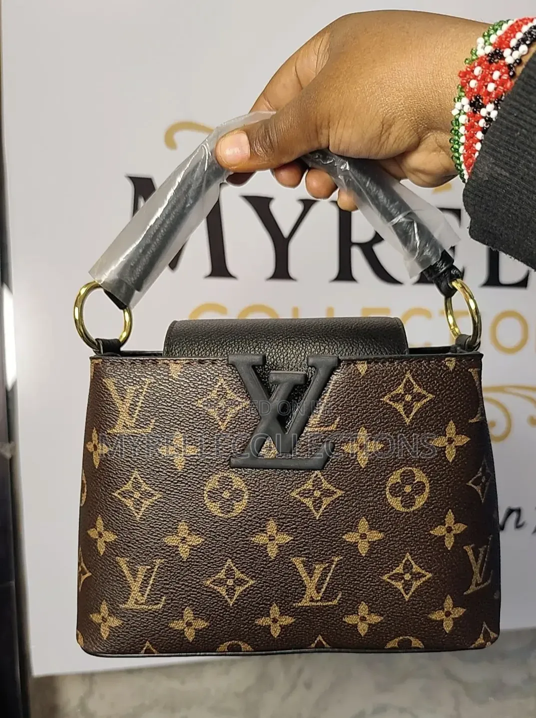 Luis Vuitton Handbag / Brown Shoulder or Crossbody Handbag