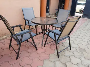 4-Seater Foldable Outdoor Dining Set With Glass Table