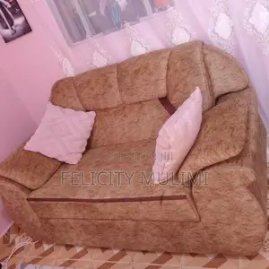 2 Seater Brown Fabric Sofa, Clean and comfortable.used for 5 Months