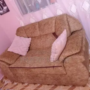 2 Seater Brown Fabric Sofa, Clean and comfortable.used for 5 Months