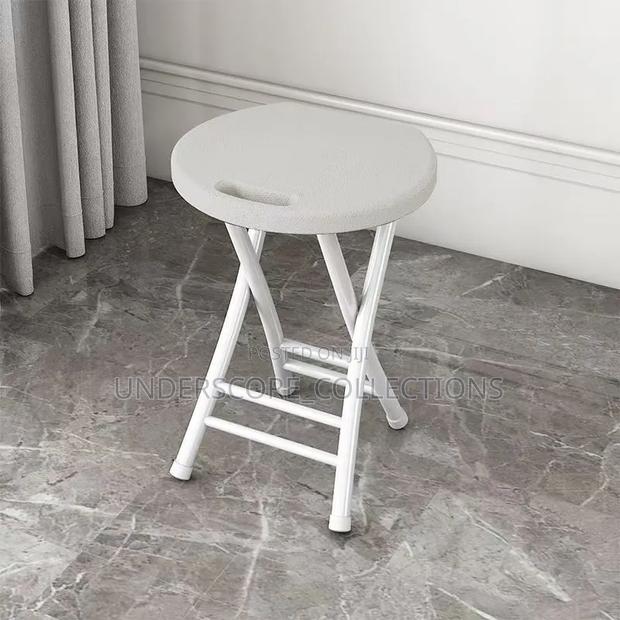 Portable Plastic Folding Stool With a Built-in Carrying Handle