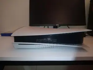 PS5 + 2 Controllers + MK11 + FIFA 22 — KSh 80,000