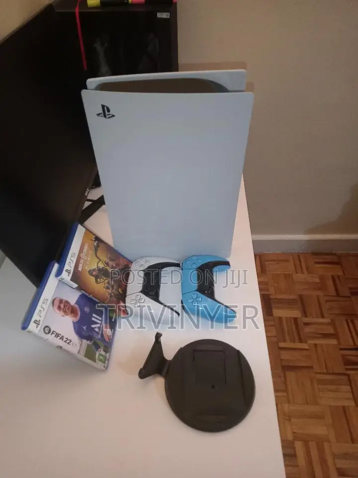 PS5 + 2 Controllers + MK11 + FIFA 22 — KSh 80,000