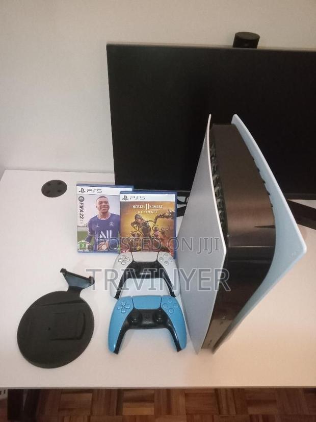 PS5 + 2 Controllers + MK11 + FIFA 22 — KSh 80,000 - thumbnail 6