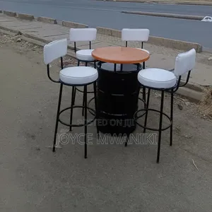 Bar Set of White Chairs and a Custom Drum Table