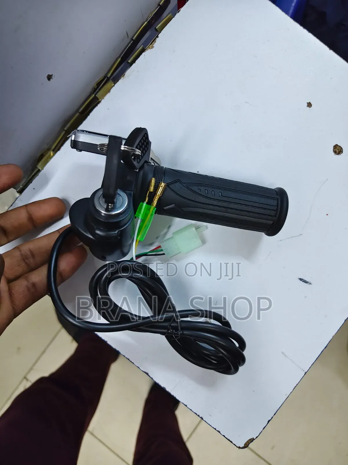 **Title:** Electric Twist Throttle Grip With Key Switch