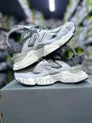 Neutral Gray New Balance 9060.  Size 36-45