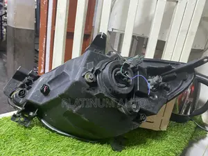 Head Light Mazda Demio 2005