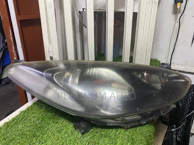 Headlight Mazda Demio 2008
