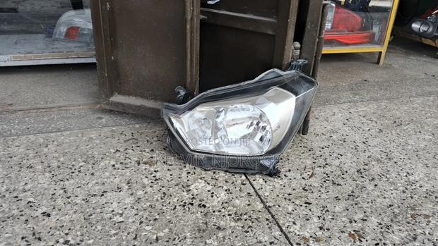 Daihatsu Mira Headlight