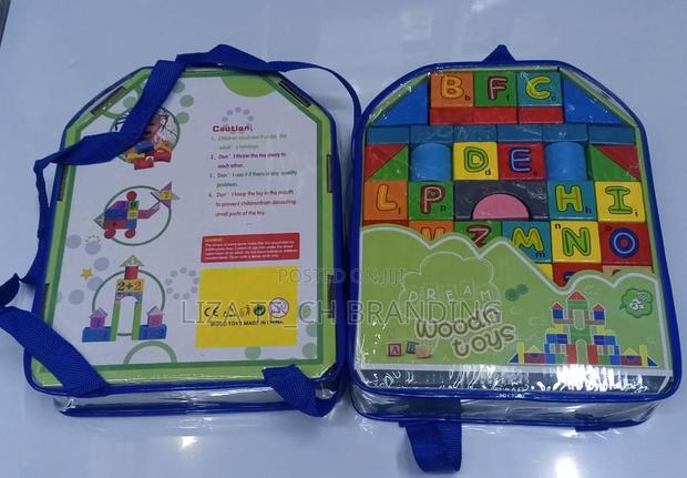 Wooden Blocks With Letters and Shapes