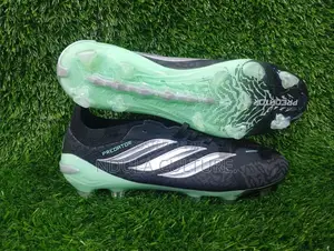 Adidas Predator 26 Elite Football Boots.