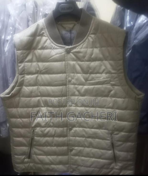 Sleeveless Puffy Jackets - thumbnail 2
