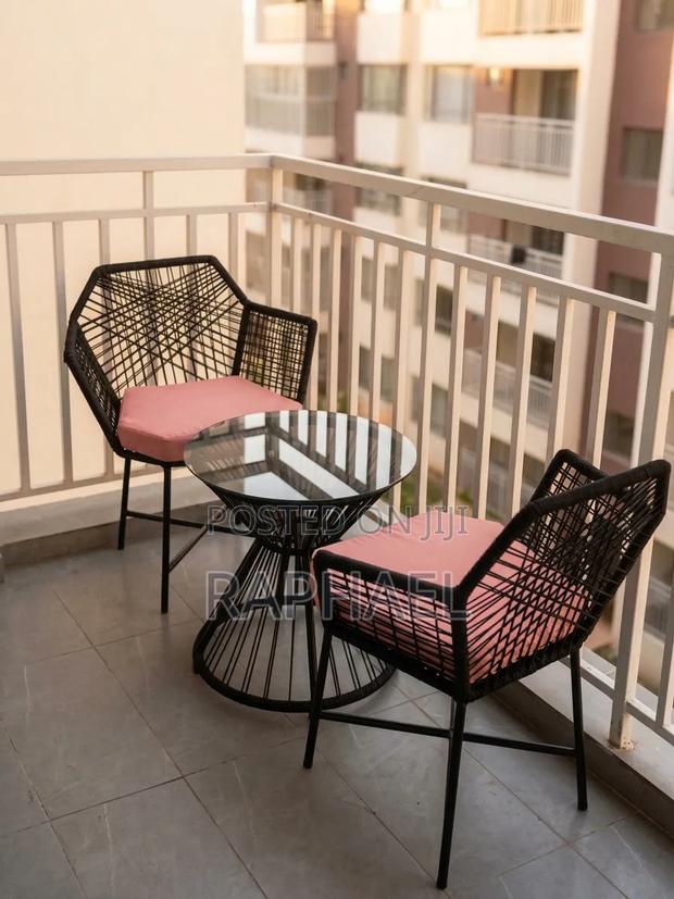 Ratam Arm Chairs and Glass Top Coffee Table