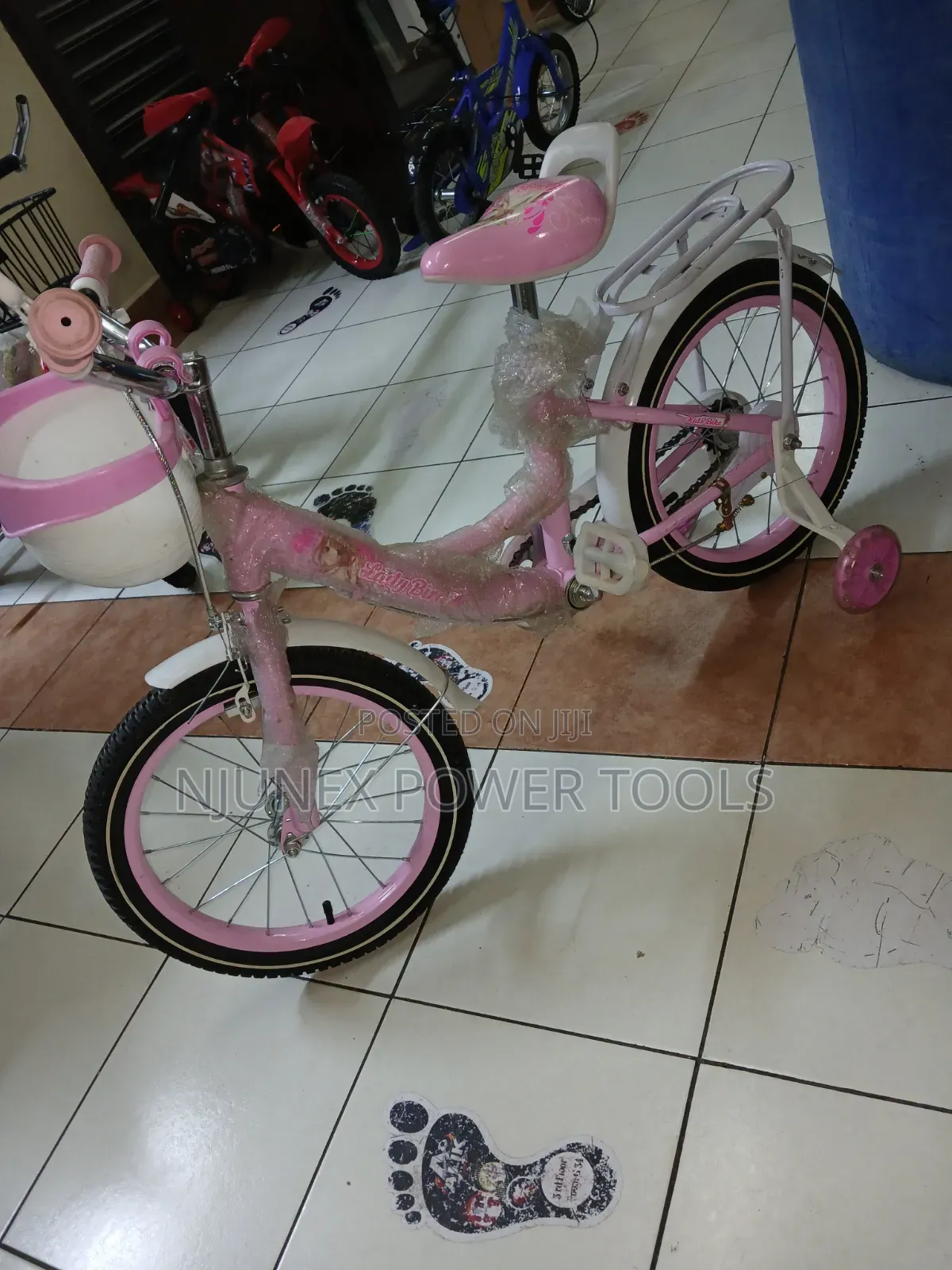 "Lady Bird" Style Bicycle Equipped With Training Wheels