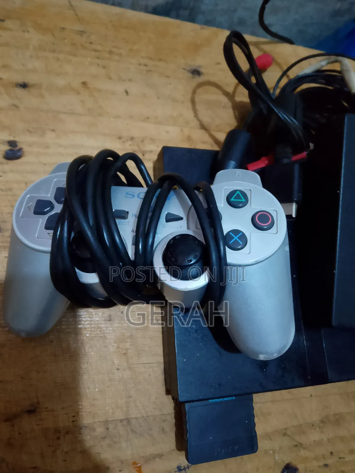 PS2 Slim Chipped + 2pads + Memory Card + 8games