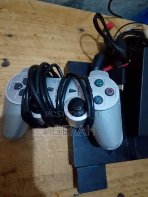 PS2 Slim Chipped + 2pads + Memory Card + 8games