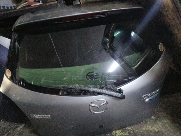 Mazda Demio Tail Gate