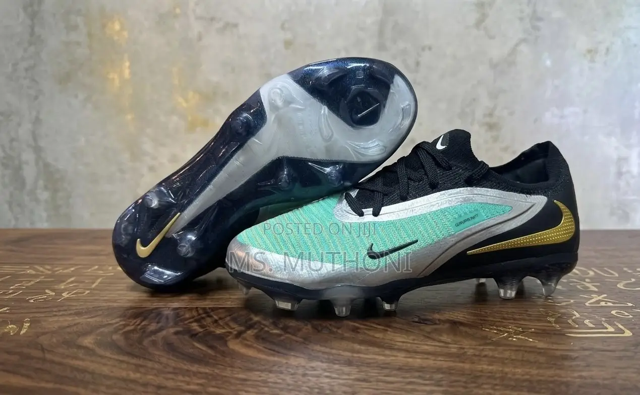 Size 30-35 (Kids ) Nike Jr. Phantom GX Academy