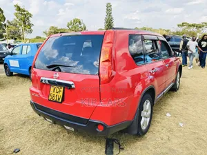 Nissan X-Trail 2.5 Petrol 4x4 SE 2009 Red