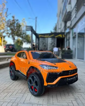 **Lamborghini Urus Licensed Kids Electric Ride-on Car Orange **