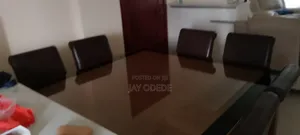 Malaysian Mahogany Wooden and Glass 8 Seater Table.