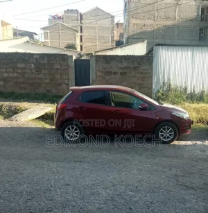 Mazda Demio 2012 Maroon