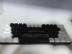 Compact Custom Mechanical Keyboard With Tuxedo Style Keycaps