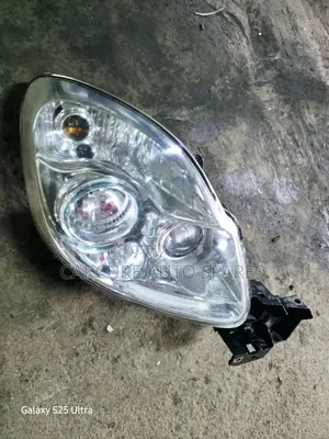 Mazda Verisa Headlight